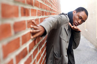 Against the wall